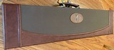 BROWNING SHOTGUN CASE, LEATHER WITH CANVAS, 2 COMBINATION LOCKS. 33 - 1 of 3