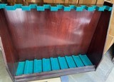 GUN RACK, HAND MADE, TRUE HEAVY DARK MAHOGANY,
FREE STANDING, IN GREAT CONDITION. - 1 of 3