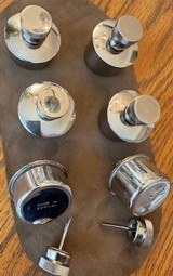 OIL BOTTLES, NICKEL, MADE IN ENGLAND, ROUND , OLD INVENTORY, NEVER USED.