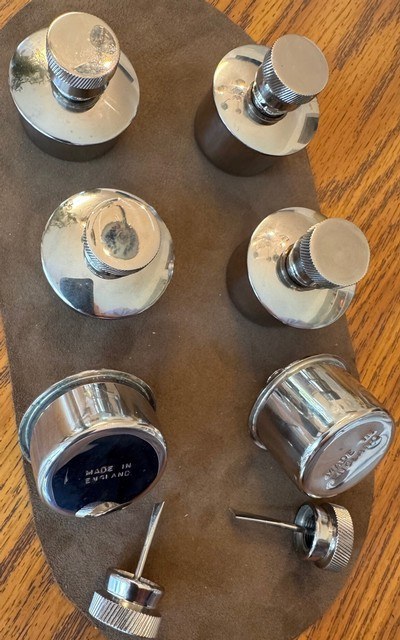 OIL BOTTLES, NICKEL, MADE IN ENGLAND, ROUND , OLD INVENTORY, NEVER USED.
