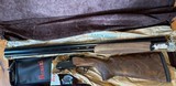 PERAZZI MX12 SPORTING, 12GA 32", ADJUSTABLE, SC2 UPGRADED WOOD, NEW, CASED