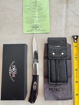 MOKI FOLDING KNIFE,VINTAGE, MIDNIGHT STONE WITH ABALONE INLAY, NEW IN THE BOX - Image 1 of 3
