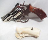 SCARCE MODEL 19-3 SMITH & WESSON REVOLVER from COLLECTING TEXAS – NICKEL with 2 1/2” BARREL – 2 PAIR of GRIPS - 16 of 18