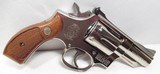 SCARCE MODEL 19-3 SMITH & WESSON REVOLVER from COLLECTING TEXAS – NICKEL with 2 1/2” BARREL – 2 PAIR of GRIPS - 18 of 18