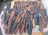 GROUP of 52 LEATHER HOLSTERS from COLLECTING TEXAS - 1 of 6