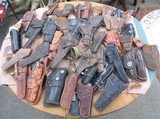 GROUP of 57 LEATHER HOLSTERS from COLLECTING TEXAS - 1 of 5