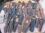 GROUP of 35 LEATHER HOLSTERS from COLLECTING TEXAS - 1 of 6