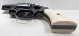 SCARCE SMITH & WESSON MODEL 15-2 REVOLVER from COLLECTING TEXAS – 2” BARREL - .38 SPECIAL CALIBER – IVORY GRIPS - 12 of 16