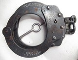 7 PAIR of HANDCUFFS with KEYS and 3 LEATHER CASES from COLLECTING TEXAS - 6 of 6