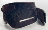 GROUP of 13 TOTAL BELTS and BUSCADEROS from COLLECTING TEXAS – H.H. HEISER, A.E. NELSON, RED MUELLER, COLORADO SADDLERY, GEO. LAWRENCE, ETC. - 21 of 25