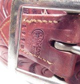 GROUP of 13 TOTAL BELTS and BUSCADEROS from COLLECTING TEXAS – H.H. HEISER, A.E. NELSON, RED MUELLER, COLORADO SADDLERY, GEO. LAWRENCE, ETC. - 8 of 25