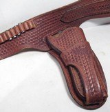TWO TEXAS MADE GUN RIGS from COLLECTING TEXAS – S.D. MYRES BASKET WEAVE STYLE RIG – TOOLED RIG for COLT S.A.A. REVOLVER - 9 of 13