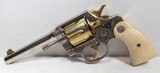 FANTASTIC ENGRAVED and HISTORIC COLT NEW SERVICE 44 RUSSIAN & SPECIAL REVOLVER from COLLECTING TEXAS – NICKEL and GOLD FINISH - 1 of 23