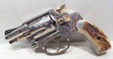FANTASTIC FRANK HENDRICKS ENGRAVED SMITH & WESSON MODEL 36 REVOLVER from COLLECTING TEXAS – 2” BARREL – GOLD ACCENTS