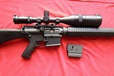 Armalite AR-10A4, .308
Win, Custom Build with Springfield Armory Gen 3 4-14x56mm scope
with rangefinding reticle. - 7 of 9