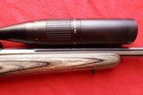 Kimber Model 84M Varmint Pro Grey Laminated Stock in .223 Rem with Nikon Monarch 6-24x44 Adjustable Objective. - 6 of 15