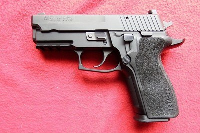 New, unfired in Factory Box. Sig P229, in 40 S&W