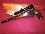 1983 Thompson Center Arms pistol with 6 barrel/caliber options, holster, scope, foregrips, and carry case. - 3 of 9