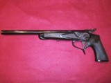 1983 Thompson Center Arms pistol with 6 barrel/caliber options, holster, scope, foregrips, and carry case. - 4 of 9