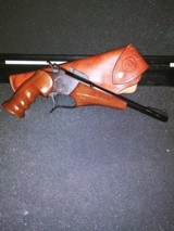 1983 Thompson Center Arms pistol with 6 barrel/caliber options, holster, scope, foregrips, and carry case. - 9 of 9