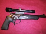 1983 Thompson Center Arms pistol with 6 barrel/caliber options, holster, scope, foregrips, and carry case. - 7 of 9
