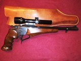 1983 Thompson Center Arms pistol with 6 barrel/caliber options, holster, scope, foregrips, and carry case. - 2 of 9