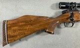 WEATHERBY MARK V DELUXE 7MM WBY. MAG. WITH 2.5-8X36 - 2 of 22