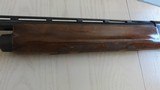 Remington 20 gauge Model 1100 Standard field model with 12 gauge receiver - 11 of 15