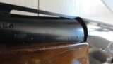 Remington 20 gauge Model 1100 Standard field model with 12 gauge receiver - 7 of 15