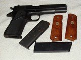 Colt 1911A1, 45 ACP, Civilian Model. Mfg. 1964 Ser # 295797-C;
with holster 2 mags and extra Colt wood grips. - 1 of 15
