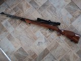 Weatherby Mark XXll Deluxe 22LR Tube Fed with Weatherby 4x50 scope. 99% like new condition!