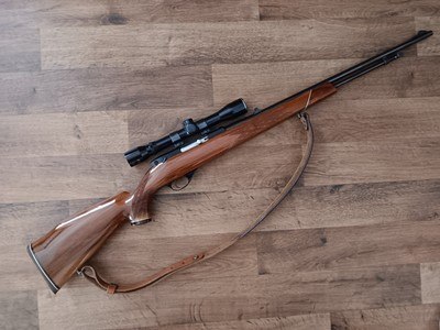 Weatherby Mark XXll.22lr tube fed, beautiful dark wood, with scope and sling!