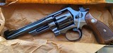 Smith and Wesson model 27-2 Blue with 6" barrel.Never fired! 1969 with original box, papers, store ticket showing price paid of $147 - 4 of 9