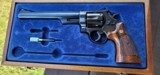 Smith and Wesson Model 25-5
45 Long 8 3/4" barrel, blue, box - 1 of 7