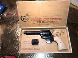 COLT FRONTIER SCOUT ,BLUE , DUAL CYL. AND BOX , 22LR
& .22 MAG - 1 of 7