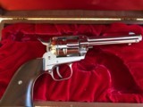 COLT SINGLE ACTION FRONTIER SCOUT .22LR
IN WOOD DISPLAY CASE NICKEL 1960'S
"PERFECT" - 5 of 10