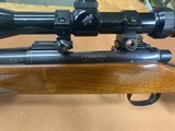 Nice Remington 700 rifle in 6 mm Rem, 22” barrel wood stock and vintage Tasco scope - 11 of 15