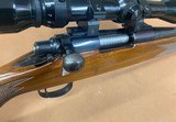 Nice Remington 700 rifle in 6 mm Rem, 22” barrel wood stock and vintage Tasco scope - 12 of 15