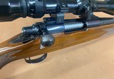Nice Remington 700 rifle in 6 mm Rem, 22” barrel wood stock and vintage Tasco scope - 12 of 15