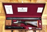 RAICK FRERES LIEGE BOXLOCK EJECTOR 375 FLANGED MAG DOUBLE RIFLE 26 1/16
BARRELS CASED WITH 86 ROUNDS OF AMMUNITION