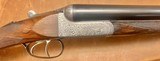 ARMSTRONG & CO NEWCASTLE 12GA TOP QUALITY BOXLOCK EJECTOR 30” C/F SET UP FOR LEFT HANDED SHOOTER FULL COVERAGE SCROLL ENGRAVED ACTION FIGURED WOOD