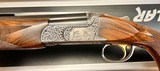 ONE OF THE FINEST KOLAR ONE OF A KIND .750 BORE 32” FLAT RIB SPORTING BULINO GAME & SCROLL BY MASTER ENGRAVER THIERRY DUGUET EXHIBITION WOOD - 2 of 21