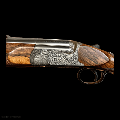 ***SOLD*** PERAZZI SCO 12GA 32” BARRELS WITH EIGHT TEAGUE CHOKES FULL COVERAGE DEEP CUT SCROLL ENGRAVING WITH CHIMERA FIGURES FIGURED WOOD