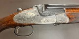 PRE WAR BERNHARD MERKEL (RETAILED BY H. BARELLA BERLIN) BEST SIDELOCK 20GA O/U 27” C/IC BARRELS OUTSTANDING QUALITY GUN BUILT IN 1923