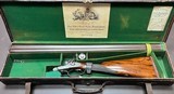 BOSS & CO 12 BORE HAMMERGUN 29 3/4” CYL/IC FINE DAMASCUS BARRELS NICLEY FIGURED WOOD WITH IDEAL MODERN DIMENSIONS CASED ORIGINALLY BUILT IN 1862 - Image 1 of 23