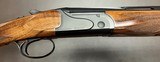 RIZZINI BR110 SMALL .410 BORE 26 1/2” BARRELS TEN CHOKES FACTORY UPGRADED WOOD EXCELLENT CONDITION CASED WITH ACCESSORIES BUILT IN 2019 - Image 2 of 21