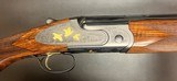 CAESAR GUERINI MAGNUS LIGHT 12GA 26” BARRELS GOLD GAME SCENE & SCROLL ENGRAVED ACTION 6LBS 2OZ STUNNING LIGHTWEIGHT O/U CASED BUILT IN 2007 - Image 1 of 23