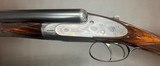 JAMES PURDEY 12 BORE BEST SIDELOCK EJECTOR 28” IC/IC BARRELS NICLEY FIGURED WOOD LEATHER CASE WITH ACCESSORIES FINE CONDITION BUILT IN 1900