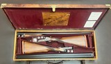 COGSWELL & HARRISON LONDON PAIR OF 12 BORE ASSISTED OPENING BOXLOCK EJECTORS 30” IC/M BARRELS FINE CONDITION CASED BUILT IN 1937 - Image 1 of 22