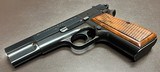 PRISTINE ORIGINAL CONDITION BROWNING HI POWER T SERIES 9MM PISTOL THREE MAGAZINES, ORIGINAL POUCH, & OWNERS MANUAL BUILT IN 1969 - Image 5 of 9